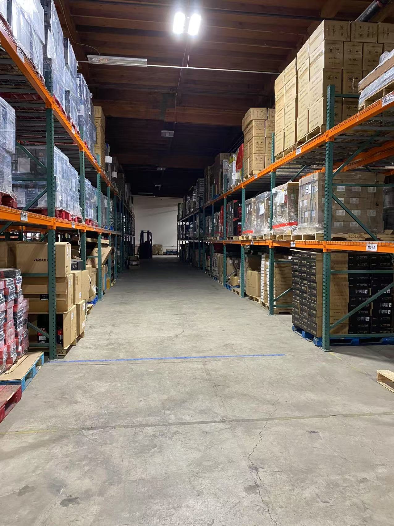Warehouse aisle with organized inventory